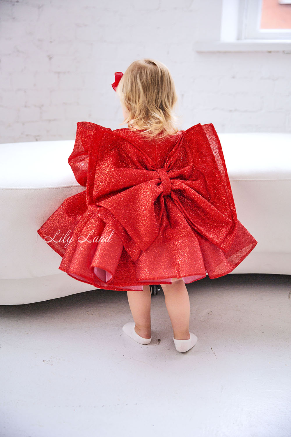 Goldie Girl Dress In Gold With A Huge Bow At The Back