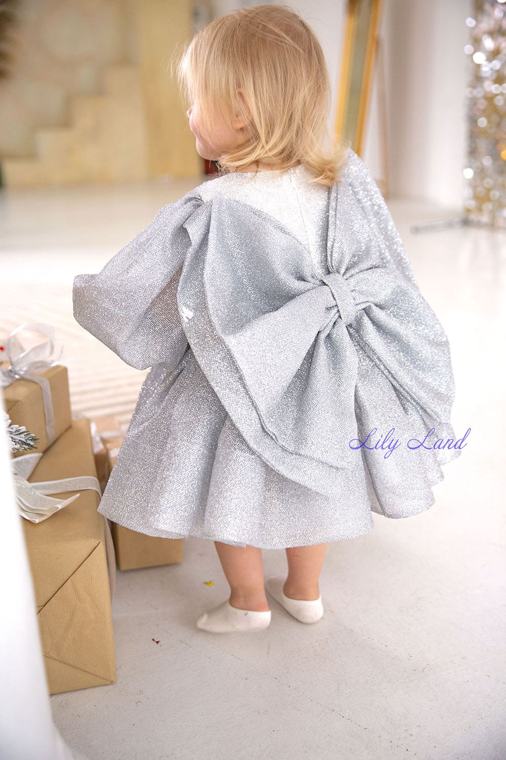 Goldie Girl Dress In Silver With A Huge Bow At The Back