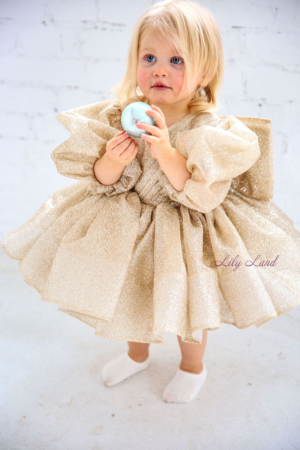 Goldie Girl Dress In Gold With A Huge Bow At The Back
