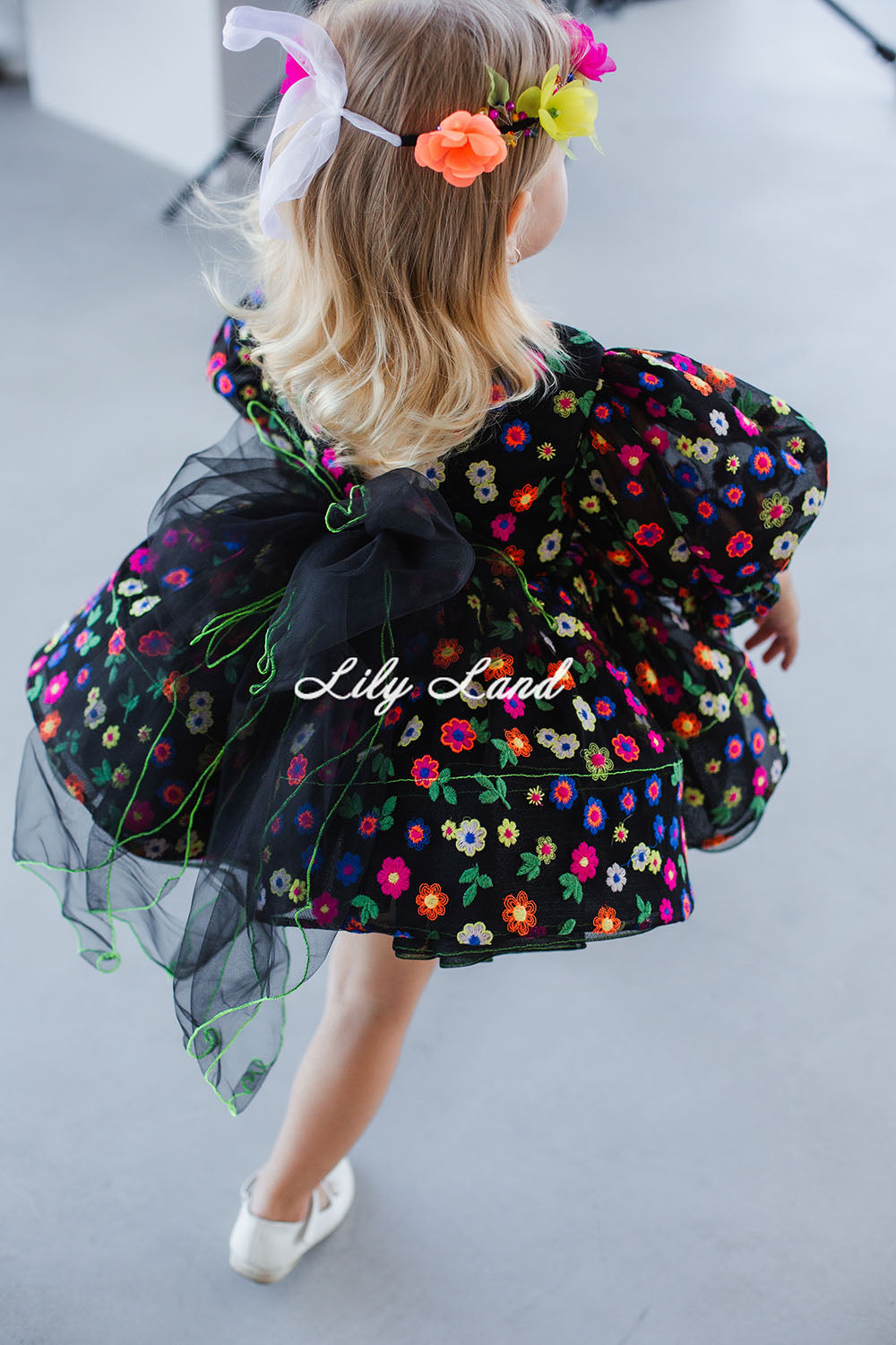 Cheryl Puffy Girl Dress in Black with Multicolored Bright Flowers