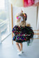 Cheryl Puffy Girl Dress in Black with Multicolored Bright Flowers